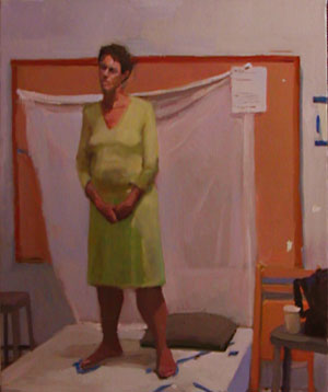 standing woman in green